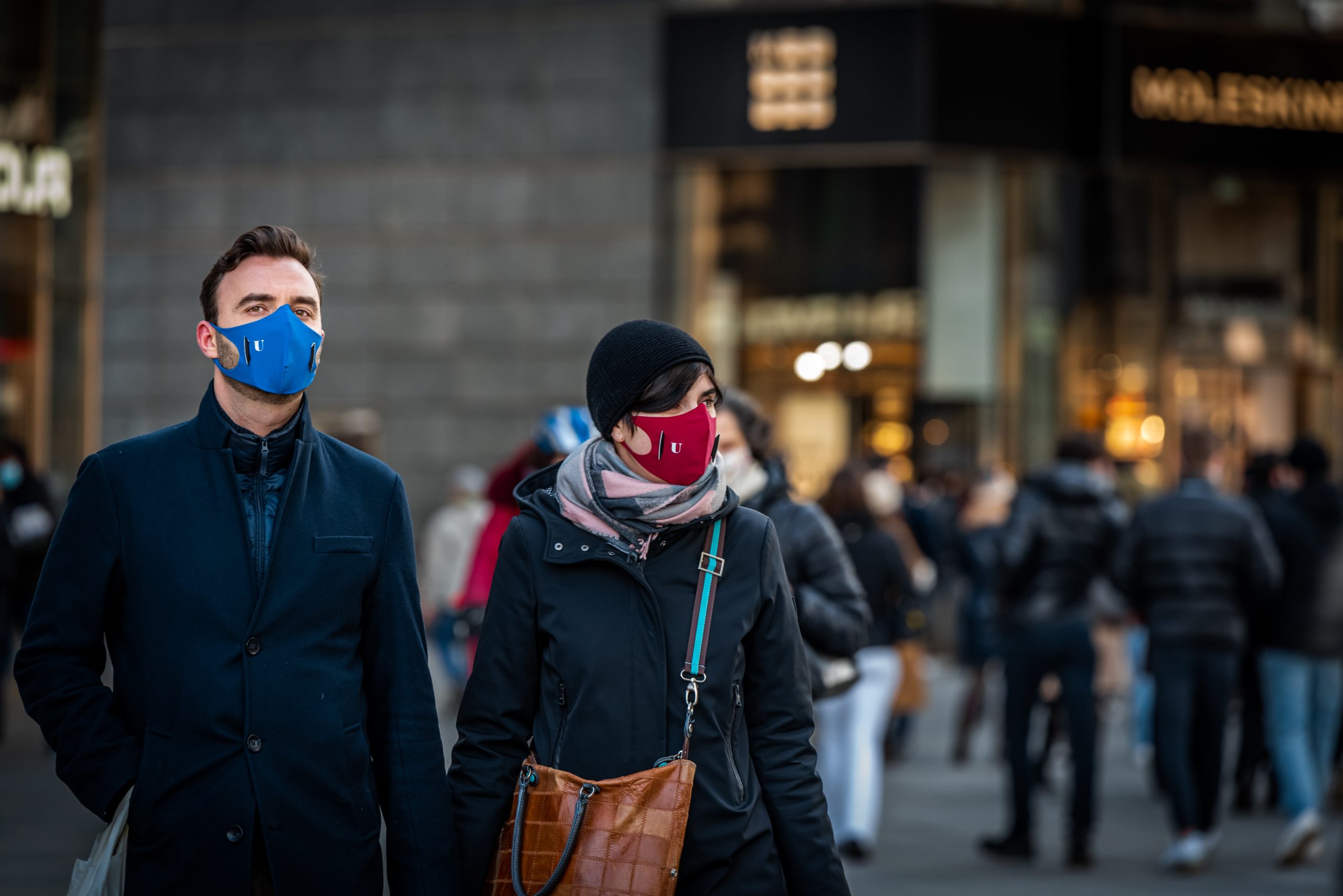 A couple wearing masks out for a walk