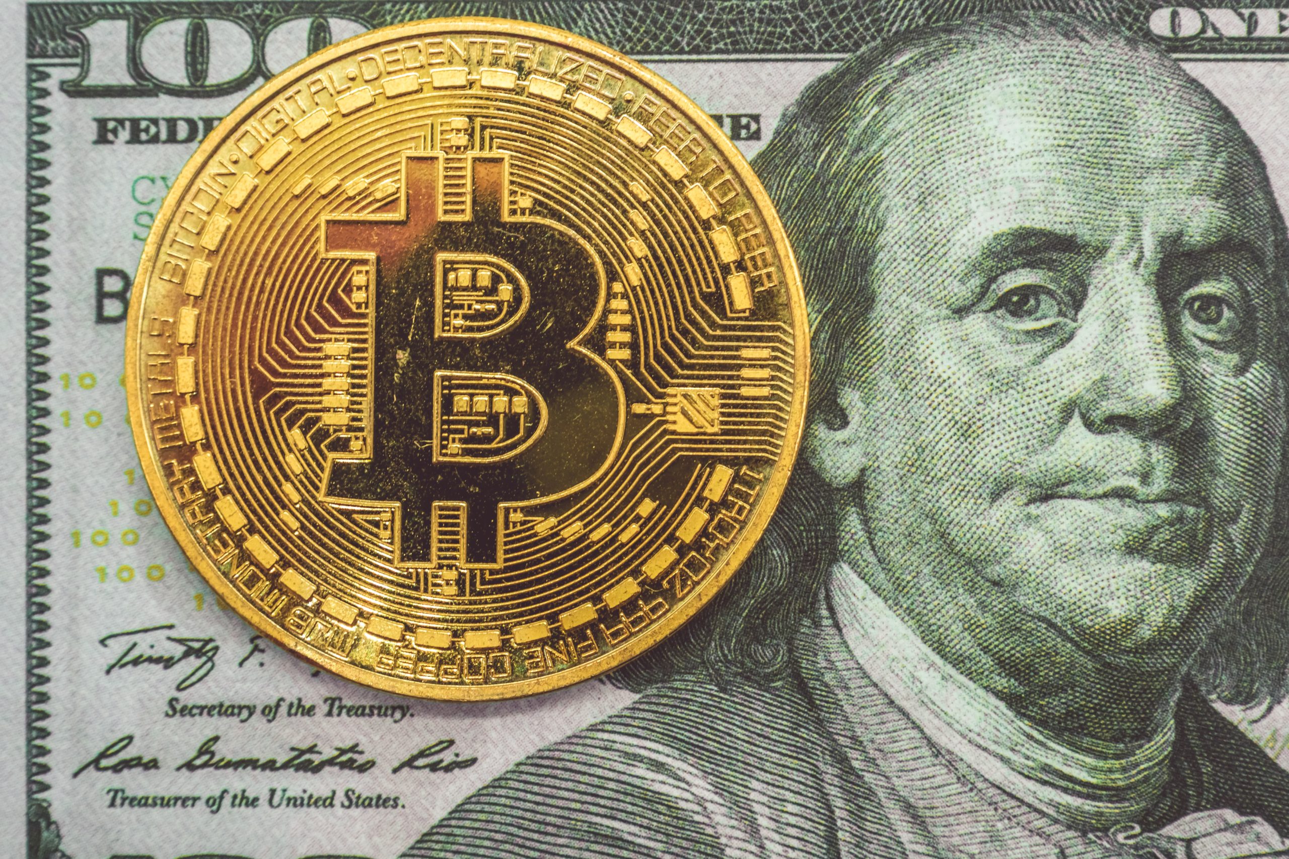 Bitcoin on US$100 bill
