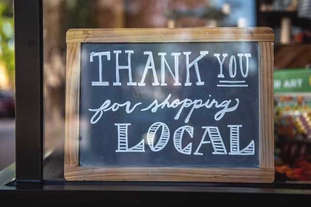 “Thank you for shopping local” sign