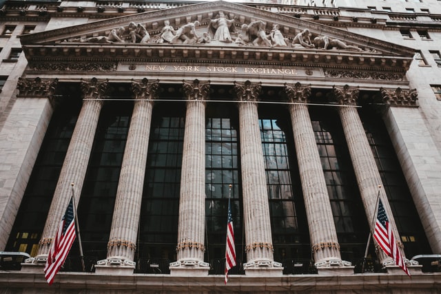 Photo of the front of the New York Stock Exchange building.