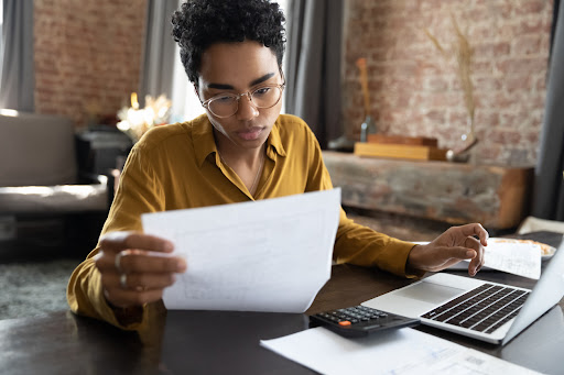 Entrepreneur handling business expense management.