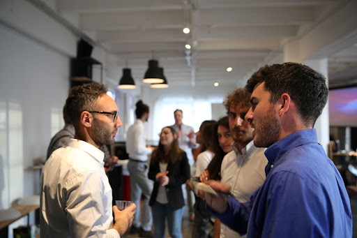 People engage in business networking.