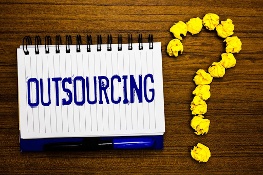 The option of outsourcing financial services being explored by a small business owner.