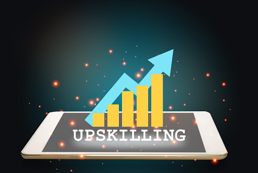 Upskilling and growth graph on computer tablet