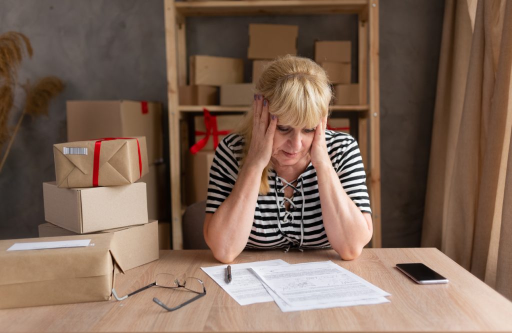 Small business owner stressed amidst accountant shortage.