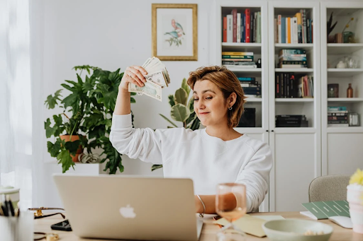 An entrepreneur joyous to see a healthy cash flow in business