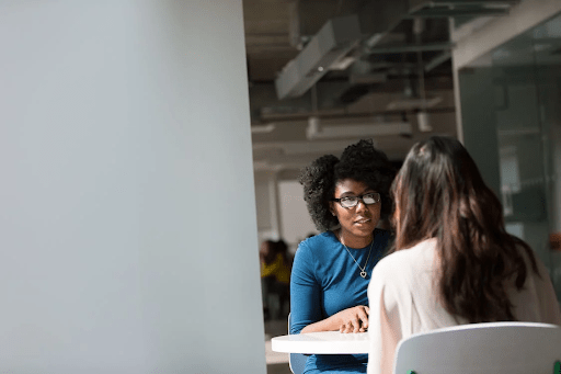 A manager conducting a stay interview
