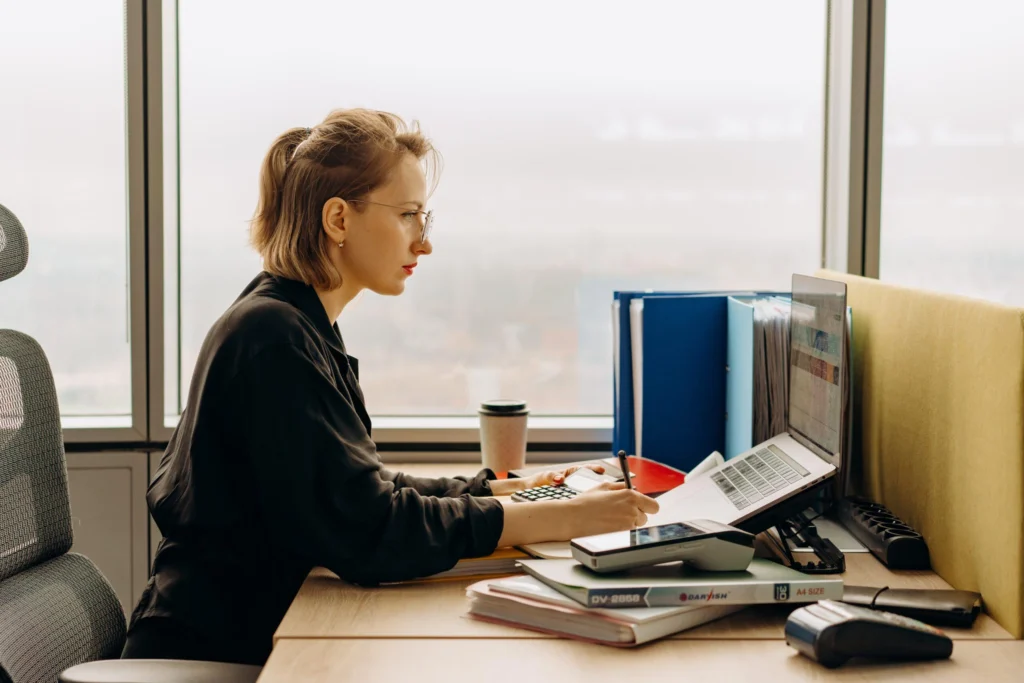 Small business owner utilizing cost accounting