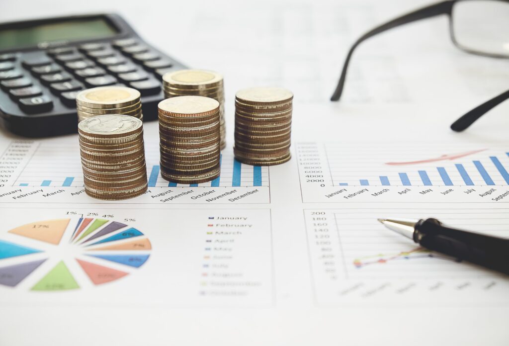 Small business owner reviewing financial statements to improve financial literacy and decision-making