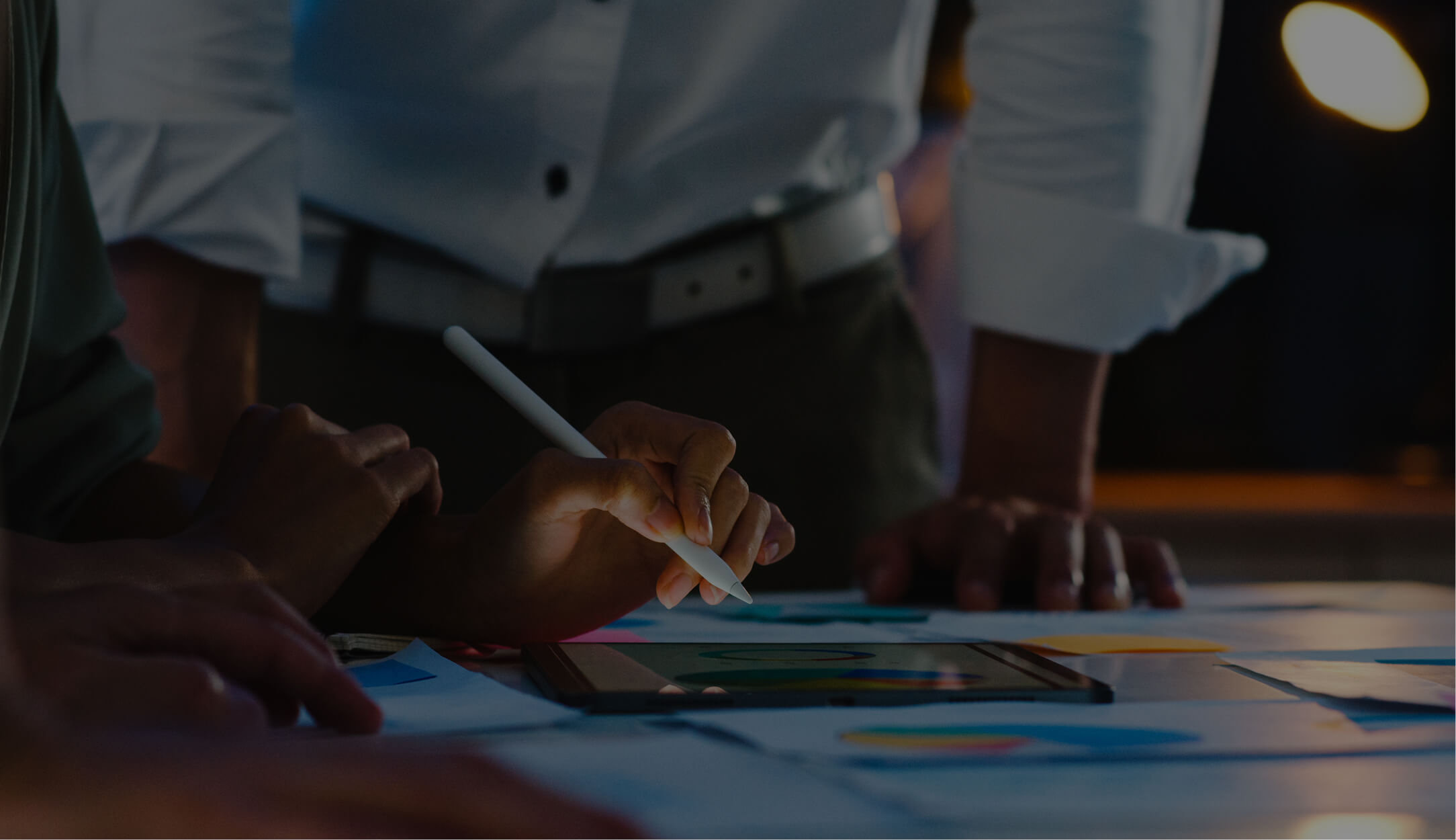 Business professionals reviewing analytics