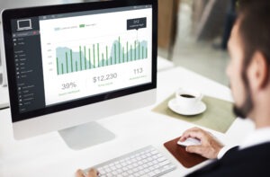 Founder reviewing fractional CFO pricing options with retainer, hourly, and project-based engagement models displayed side by side