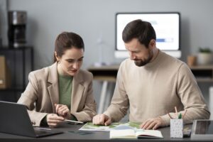 Startup founder and early employees reviewing QSBS qualification requirements and 5-year holding period rules