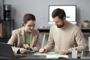Startup founder and early employees reviewing QSBS qualification requirements and 5-year holding period rules